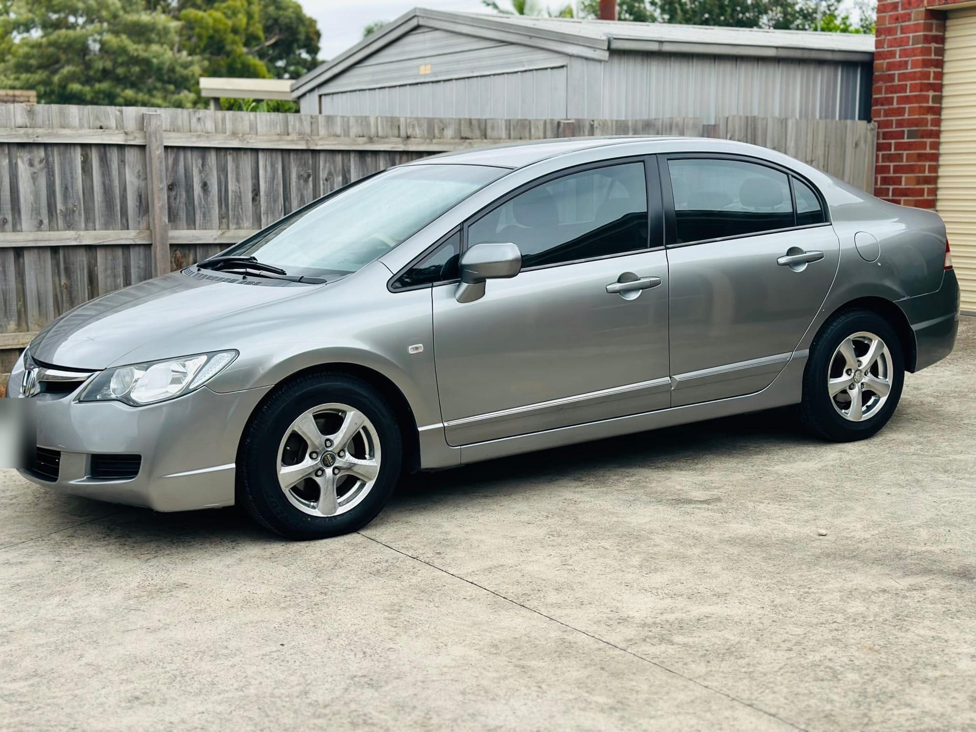 Silver Honda Civic sedan after detailing