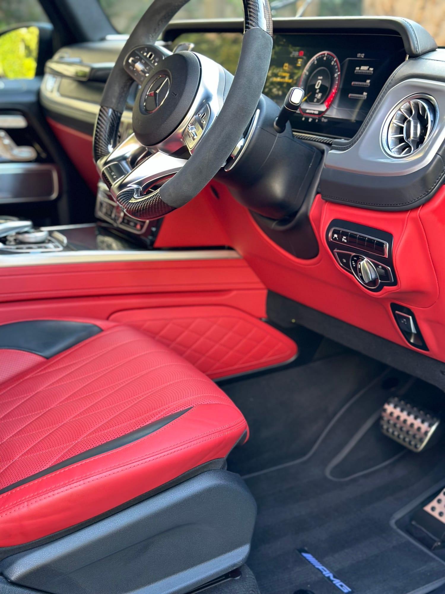 Mercedes-AMG G63 — steering wheel, dash and alloy pedals, after detailing