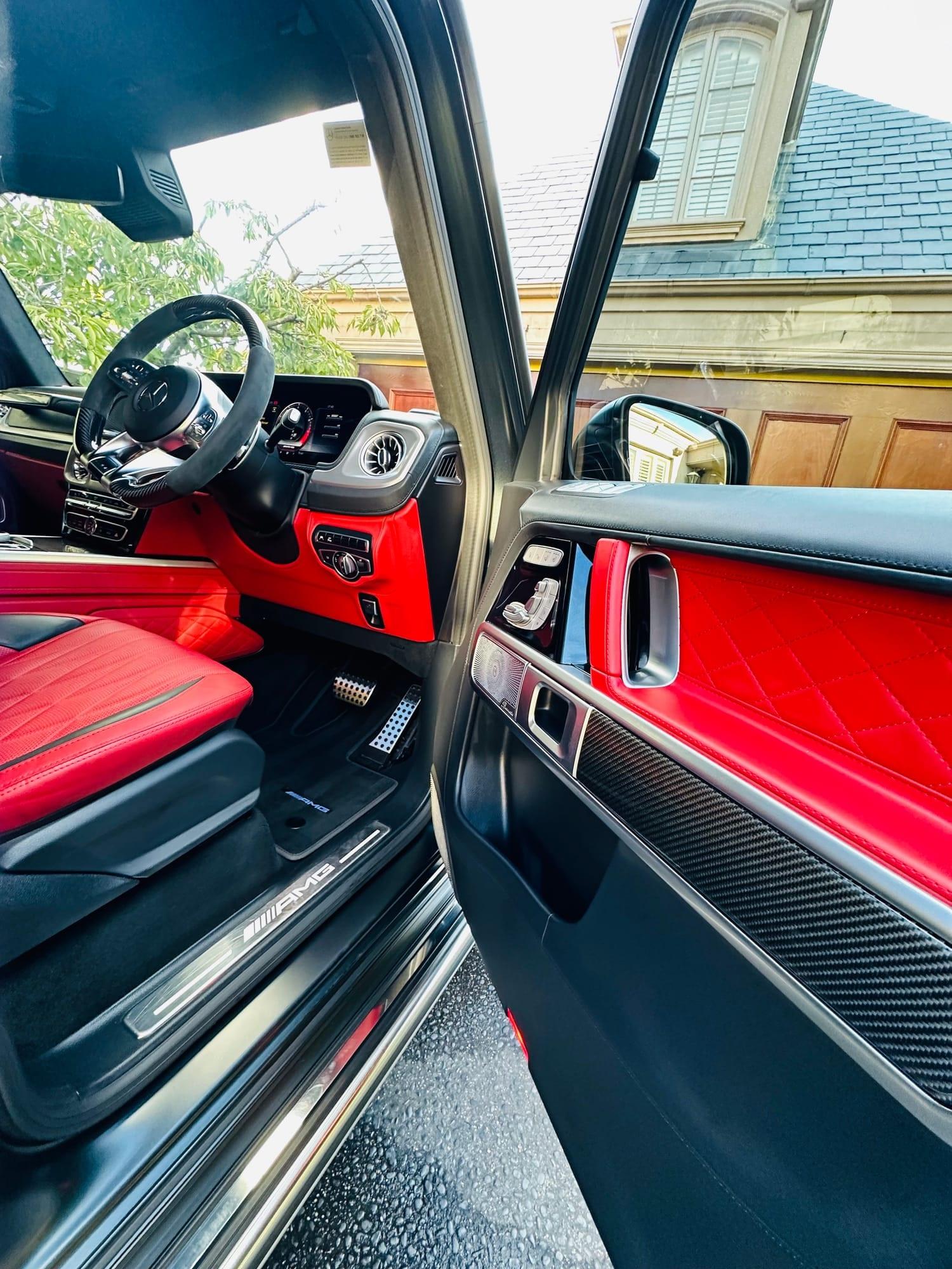 Mercedes-AMG G63 — driver's door card and carbon-fibre trim, after detailing